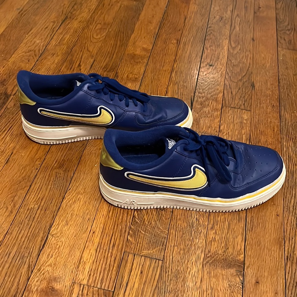 Blue and yellow Nike AF-1s slightly worn, easy to clean up